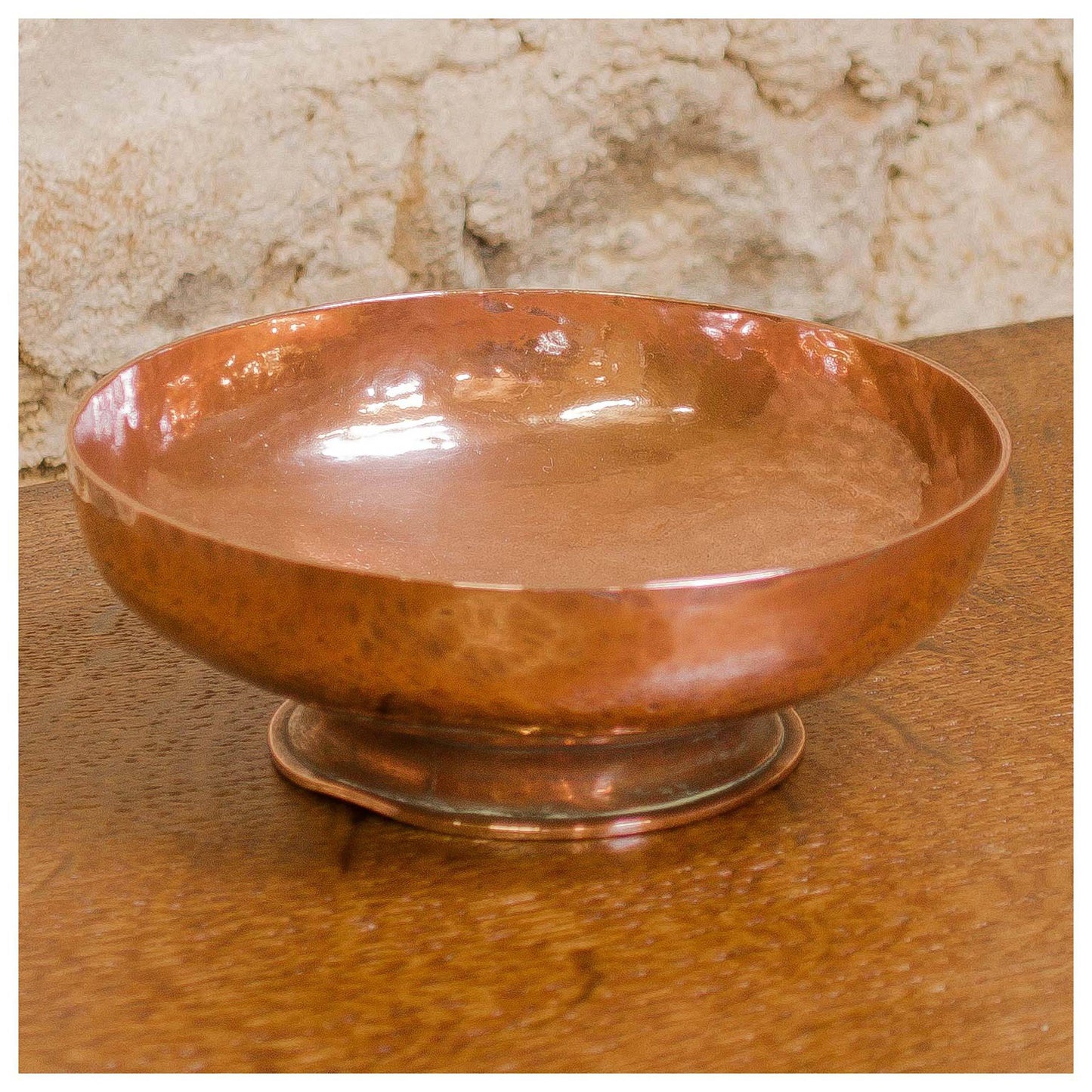 An Arts & Crafts Lakes School hand beaten copper bowl by Fanny Carter