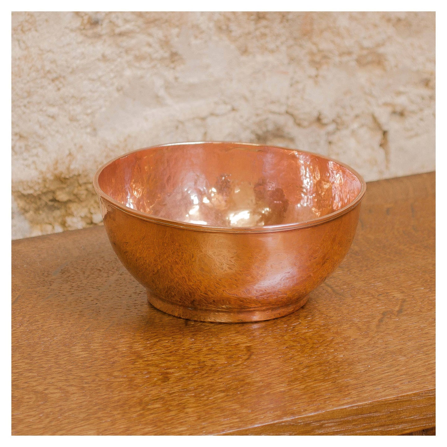 An Arts & Crafts Lakes School hand beaten copper bowl by Fanny Carter