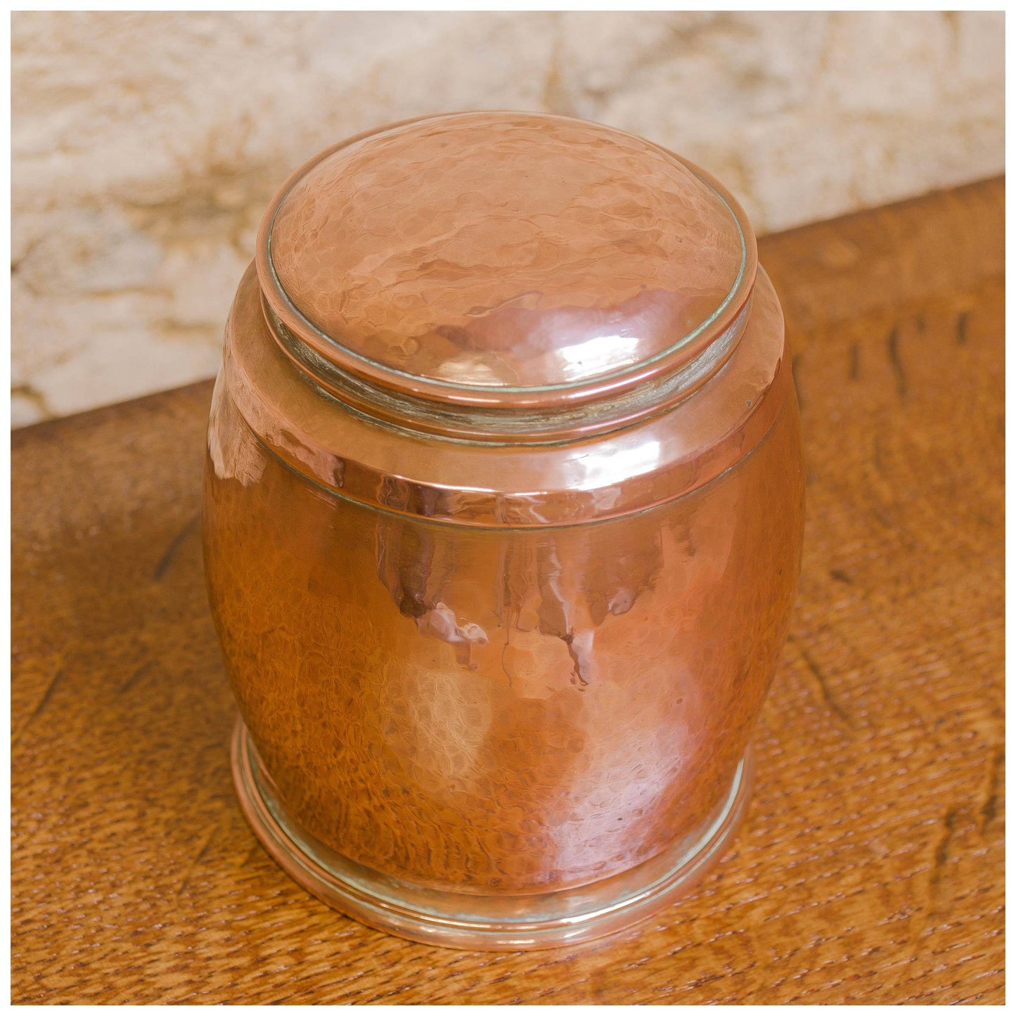 An Arts & Crafts Lakes School hand beaten copper jar by Fanny Carter