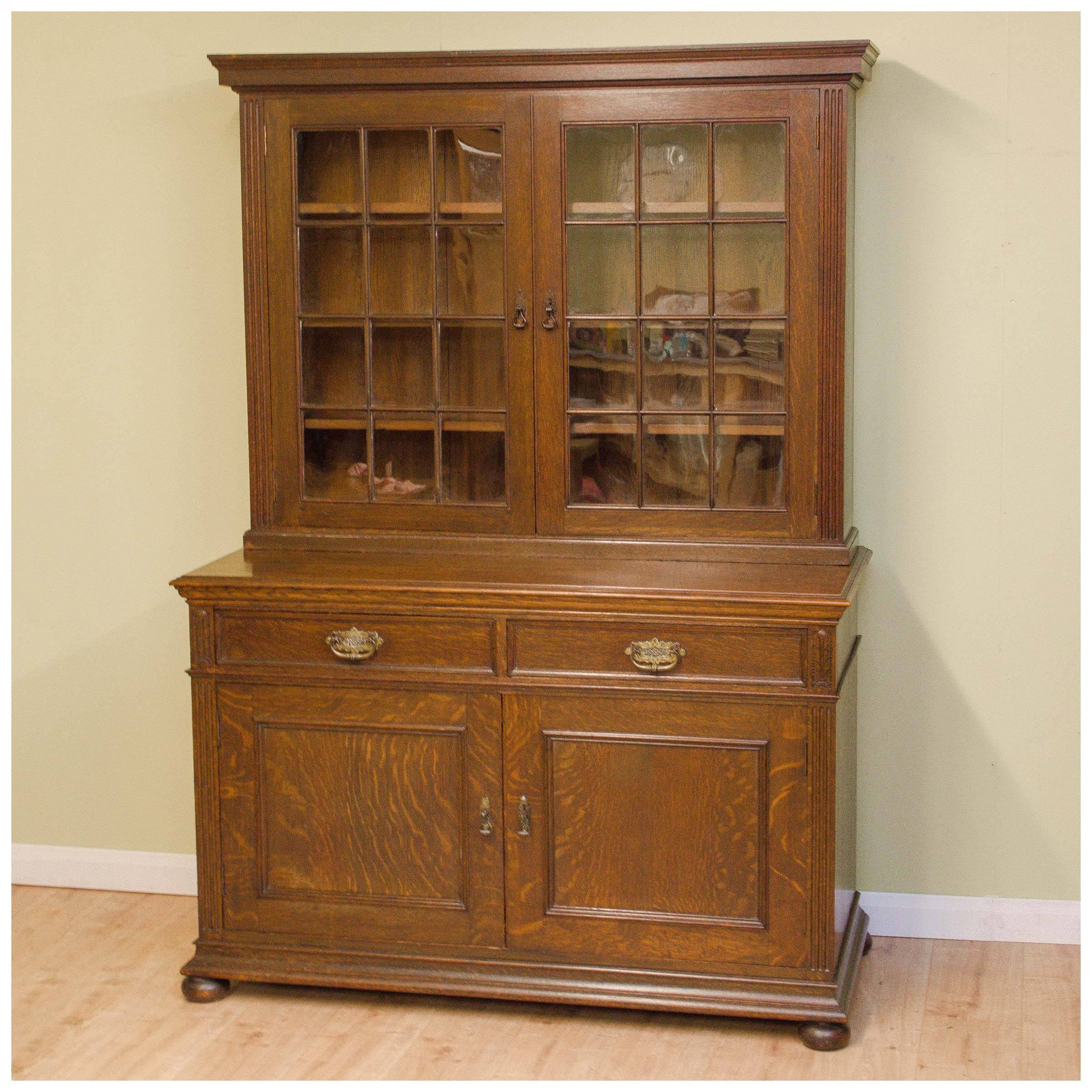 Liberty & Co A Late Victorian Glazed Quarter-Sawn Oak Library Bookcase