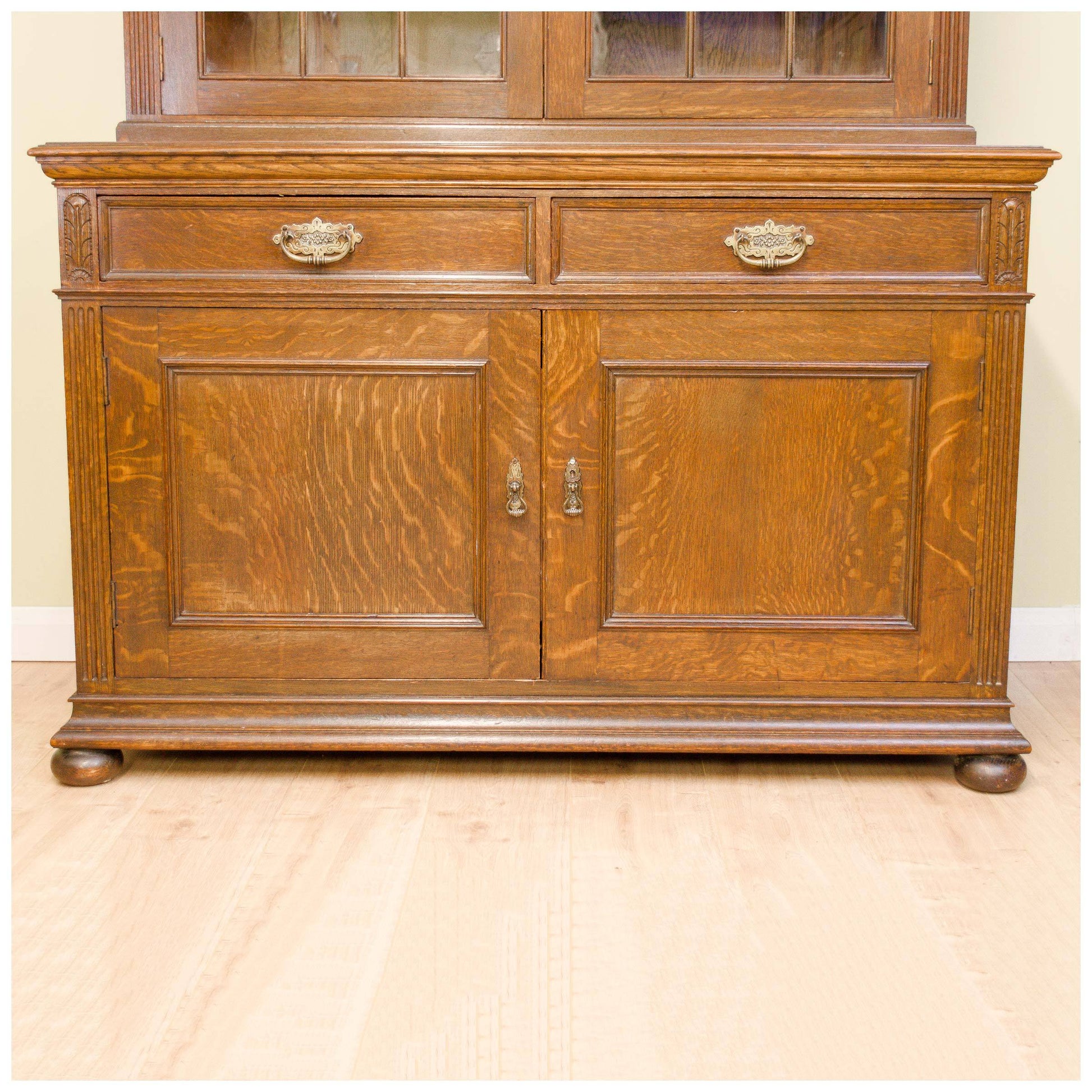 Liberty & Co A Late Victorian Glazed Quarter-Sawn Oak Library Bookcase