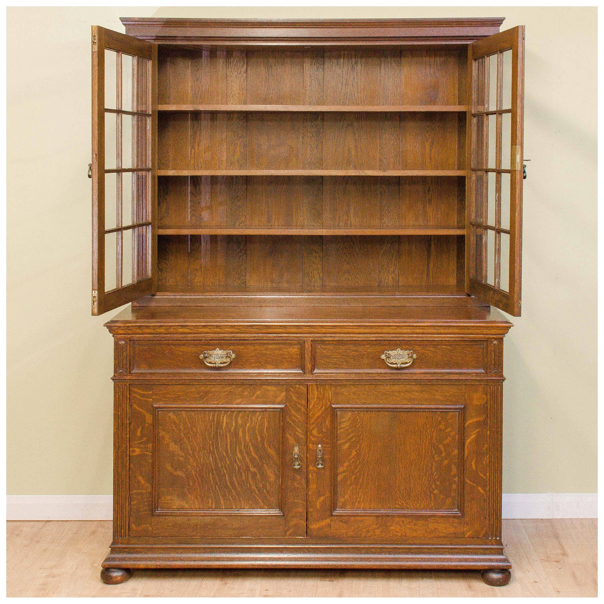 Liberty & Co A Late Victorian Glazed Quarter-Sawn Oak Library Bookcase