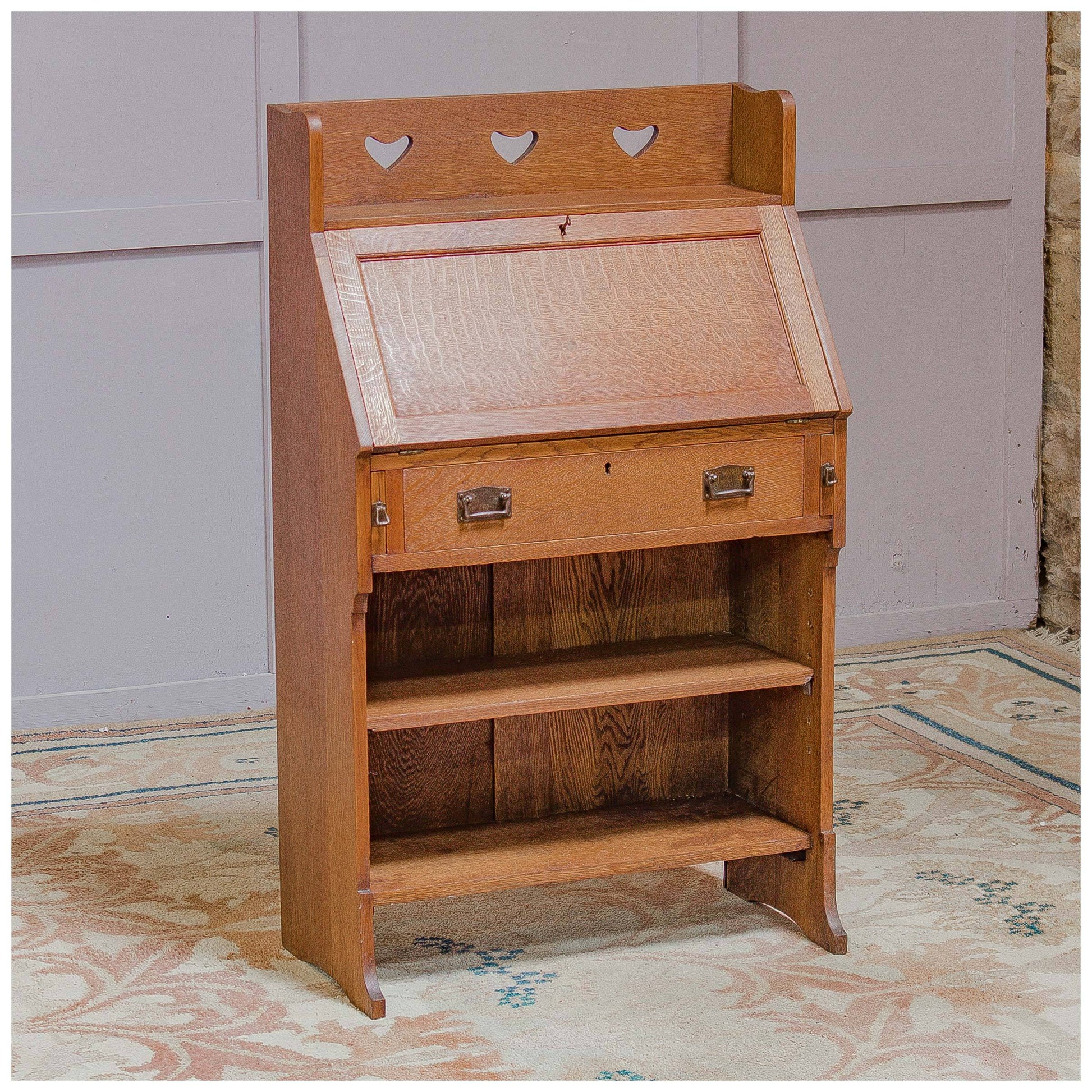 Liberty & Co Arts & Crafts English Oak 'Chaucer' Bureau c 1910 with heart motifs