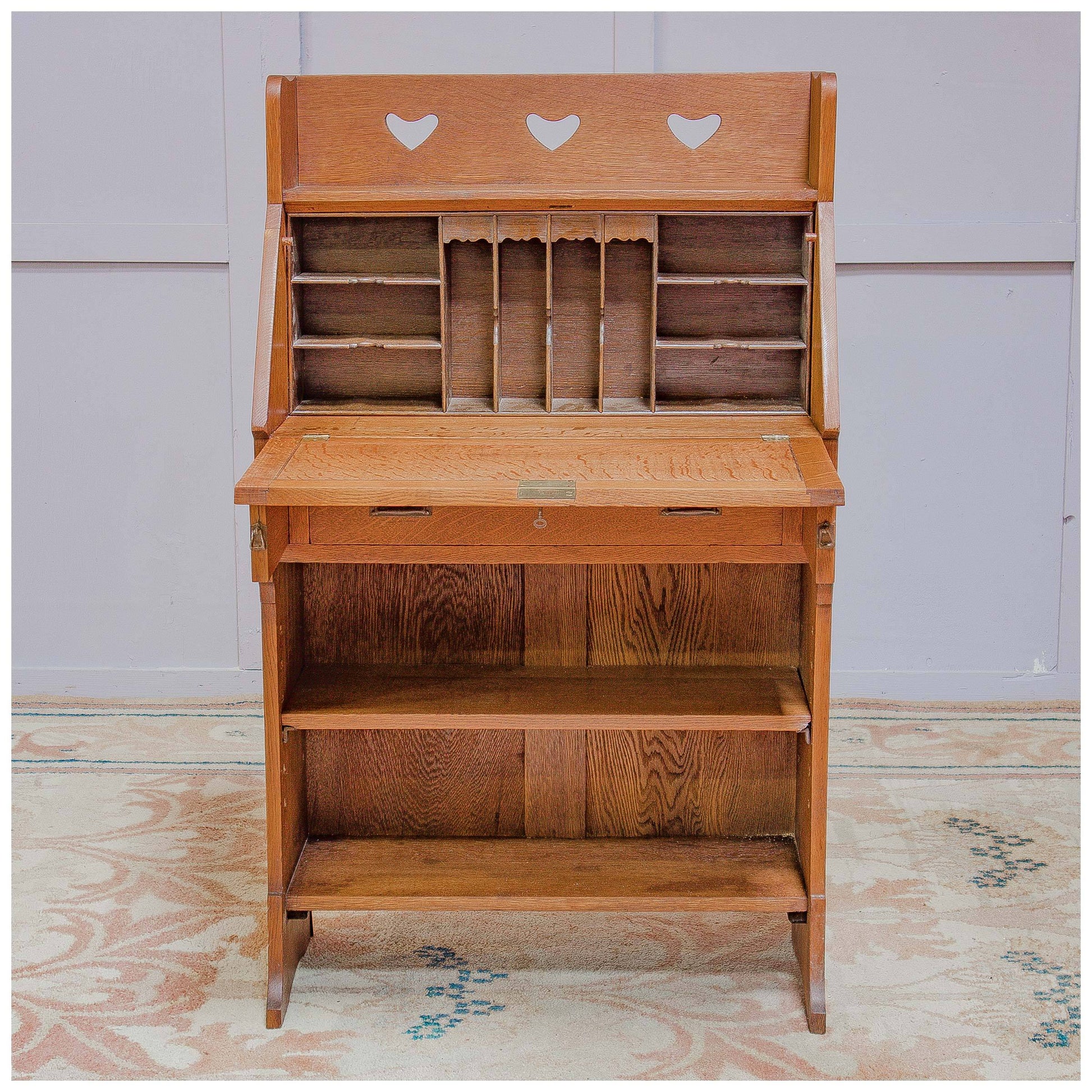 Liberty & Co Arts & Crafts English Oak 'Chaucer' Bureau c 1910 with heart motifs