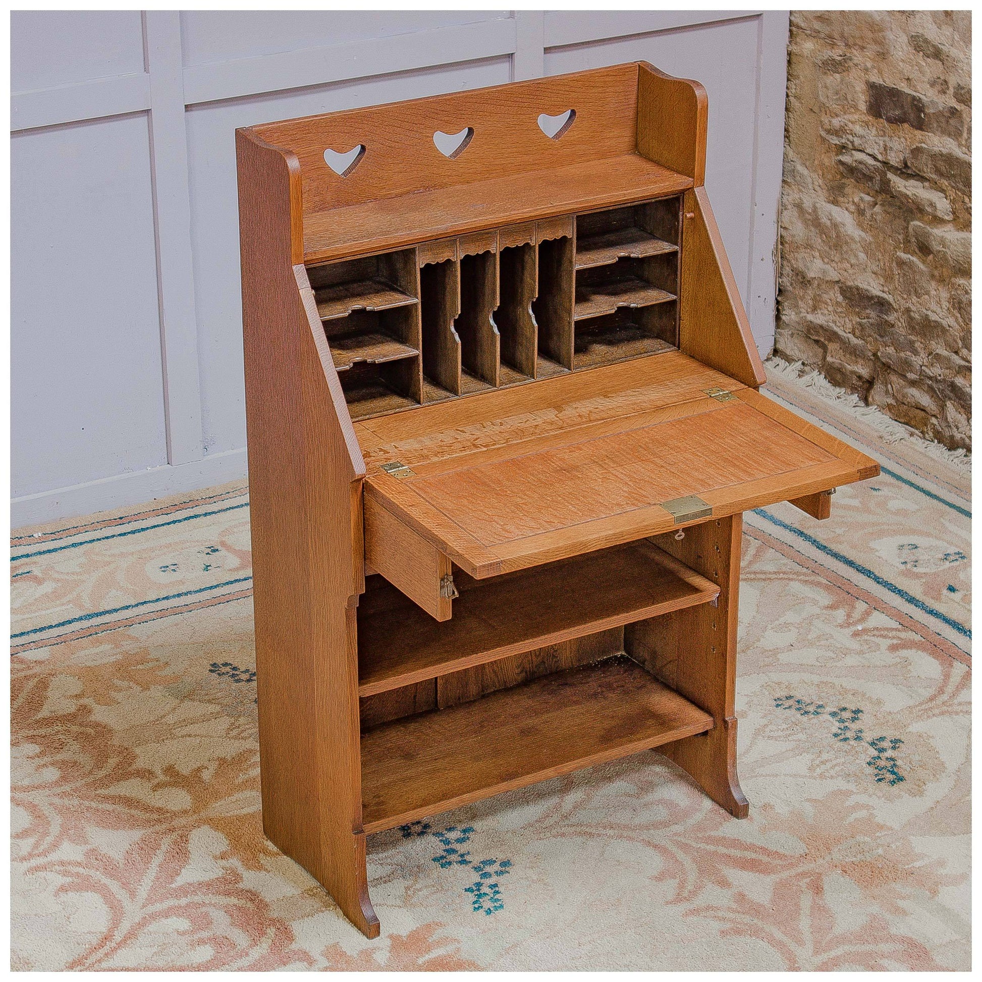 Liberty & Co Arts & Crafts English Oak 'Chaucer' Bureau c 1910 with heart motifs